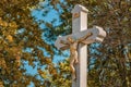 Crucifixion, statue of Jesus Christ on concrete cross on cemetery Royalty Free Stock Photo