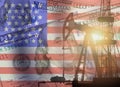 Crude oil and petroleum concept. Pump jack, US 100 USD dollar notes and American flag background