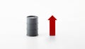 Crude oil price going up or rising. Rising energy prices. Crude oil barrel isolated on neutral white with a red arrow going poiup. Royalty Free Stock Photo