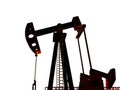 Crude oil pump or oil rig silhouette Royalty Free Stock Photo