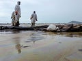 crude oil spill in the middle of the Rayong sea, Samet Islands, staffed and volunteers helping to clean up