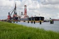 Crude oil tanker anchored in harbor Rotterdam, Netherlands. Royalty Free Stock Photo