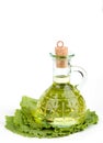 Cruet with oil on lettuce Royalty Free Stock Photo