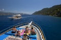 A cruise boat floats past Kekova Island in Turkey.