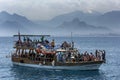 A cruise boat sails through Antalya Bay off Antalya in Turkey.