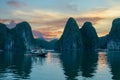 Cruise boat at sunst in Halong Bay Vietnam Royalty Free Stock Photo