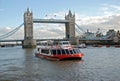Cruise boat and Tower Bridge Royalty Free Stock Photo