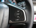 Cruise control buttons on modern car and speed limitation