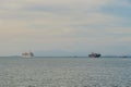 Cruise liner and cargo ship on the horizon Royalty Free Stock Photo