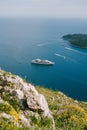 Cruise liner moored near Lokrum Island, Dubrovnik, Croatia. Royalty Free Stock Photo