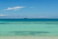 Cruise liner in light green and dark blue water of Pacific Ocean