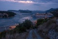 Cruise liner is preparing to leave a harbor of Dubrovnik, scenic night cityscape, Croatia Royalty Free Stock Photo