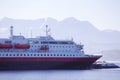 Cruise service vessel Hurtigruten under the Finnsnes bridge, Troms