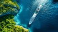 A cruise ship is anchored in the middle of a tropical bay surrounded by calm waters under clear skies Royalty Free Stock Photo