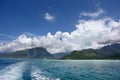 Cruise ship anchored off the coast of Moorea, one of the Windward Islands & Society Islands, French Polynesia, South Pacific Royalty Free Stock Photo