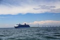 Cruise Ship by Bridge in Choppy Sea Royalty Free Stock Photo