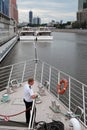 Cruise ship captain stands on a deck