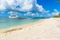 Cruise ship on Caribbean Sea close to paradise beach. Tropical travel concept and destination for vacation. Recreation and Royalty Free Stock Photo