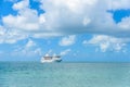 Cruise ship on Caribbean Sea close to paradise beach. Tropical travel concept and destination for vacation. Recreation and Royalty Free Stock Photo