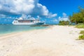 Cruise ship on Caribbean Sea close to paradise beach. Tropical travel concept and destination for vacation. Recreation and Royalty Free Stock Photo