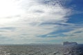 Cruise ship passing in front of Cuba, in the distance, seen across the Caribbean Sea