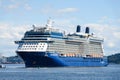 Cruise ship Celebrity Solstice in Elliott Bay Seattle under a blue sky