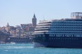 Cruise ship in the city port in the city port for tourist travel on a sunny day. The historic galata tower, which is the symbol of Royalty Free Stock Photo