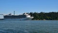 A cruise ship croses under the Lions Gate bridge as it makes its way out of the Port of Vancouver.