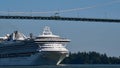 A cruise ship croses under the Lions Gate bridge as it makes its way out of the Port of Vancouver.