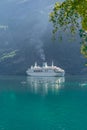 A cruise ship cruising a fjord in Norway. Cruise ship on water Royalty Free Stock Photo