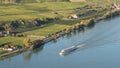 Cruise ship on Danube with vineyards