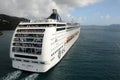 Cruise ship departing caribbean island Royalty Free Stock Photo