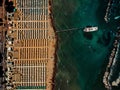 Cruise ship on dock near beach with rows of umbrella Royalty Free Stock Photo