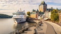 A Cruise Ship Docked At The Historic Port Of Quebec City With Towering City Walls. Generative AI Royalty Free Stock Photo