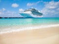 Cruise ship docked at tropical beach. Royalty Free Stock Photo