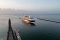 Cruise ship enters Government Cut and Port Miami at sunrise on calm summer day. Royalty Free Stock Photo