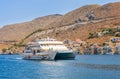 Cruise ship enters the port of the island of Sym