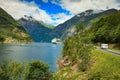 Cruise ship on fjord and camper on road, Norway Royalty Free Stock Photo