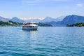 Cruise ship in front of Alps mountains peaks on Lake Lucerne, Sw Royalty Free Stock Photo