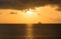 Cruise ship on horizon at sunset Royalty Free Stock Photo