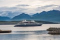 Cruise ship Le Dumont D`Urville sailing by the coast of island of Hrisey