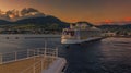 A cruise ship leaves Basseterre Bay at sunset in St Kitts Royalty Free Stock Photo