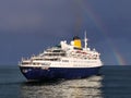 Cruise Ship Heading For Rainbow. Royalty Free Stock Photo