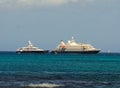 A cruise ship and luxury poweryacht at admiralty bay, bequia Royalty Free Stock Photo