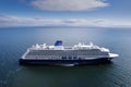 Cruise ship in the ocean, passengers loading n shuttle ferry. Blue cloudy sky. Tourism and travel concept. Elegant voyage by water