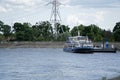 Cruise ship passenger stands on the banks of the Dniper River