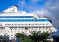 Cruise ship at the pier. Huge ship on the pier. Astoria Grande. Vacation on a cruise. At the parking lot. Expensive trip Royalty Free Stock Photo