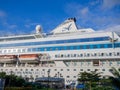 Cruise ship at the pier. Huge ship on the pier. Astoria Grande. Vacation on a cruise. At the parking lot. Expensive trip Royalty Free Stock Photo