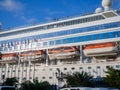 Cruise ship at the pier. Huge ship on the pier. Astoria Grande. Vacation on a cruise. At the parking lot. Expensive trip Royalty Free Stock Photo