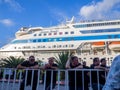 Cruise ship at the pier. Huge ship on the pier. Astoria Grande. Vacation on a cruise. At the parking lot. Expensive trip. Royalty Free Stock Photo